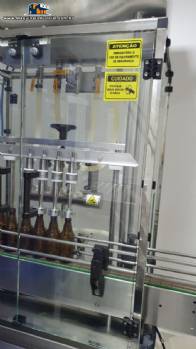 Envasadora linear com 4 bicos de envase Rotmaq